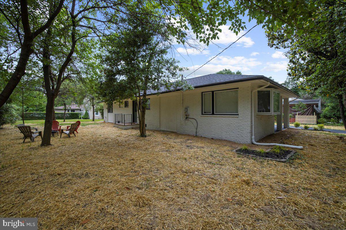 624 Sutton Drive Pasadena, MD 21122 - Photo 48 of 64 a backyard of a house with lots of green space
