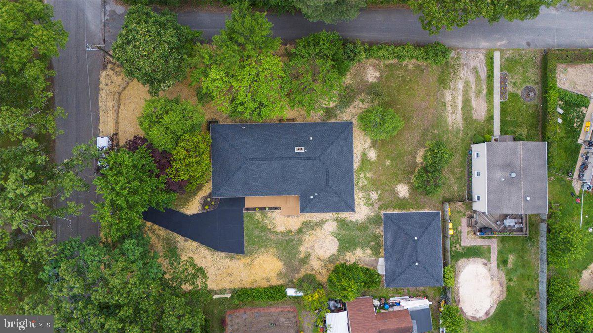 624 Sutton Drive Pasadena, MD 21122 - Photo 54 of 64 an aerial view of a house with a yard basket ball court and outdoor seating