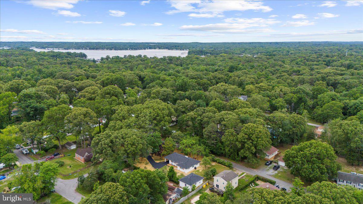 624 Sutton Drive Pasadena, MD 21122 - Photo 57 of 64 an aerial view of residential houses with outdoor space and trees