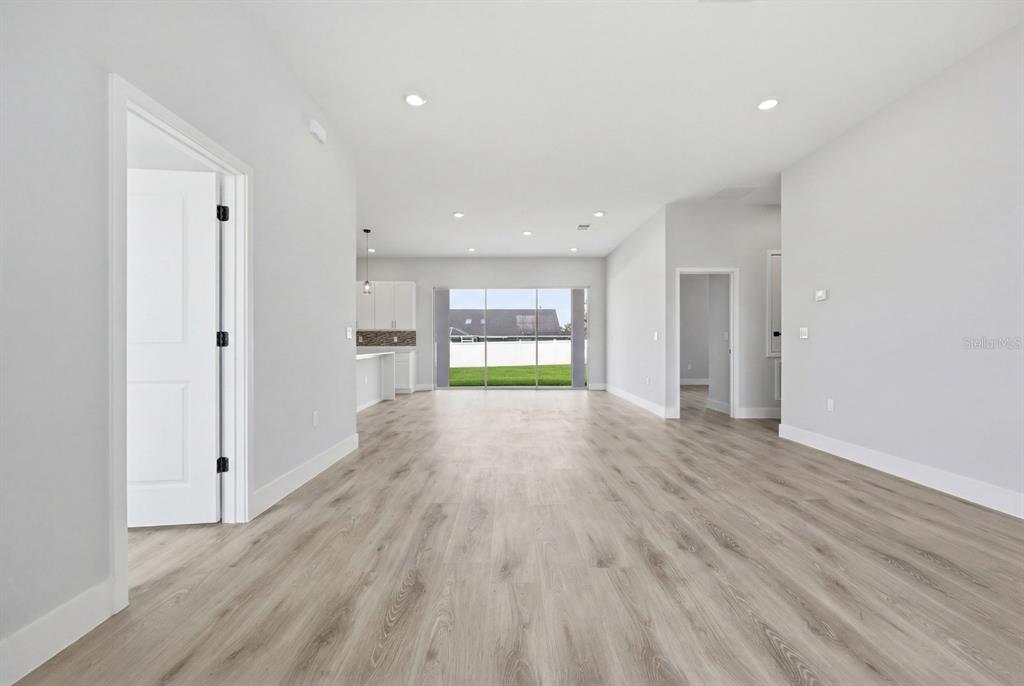 4487 Southwest 152nd Street Ocala, FL 34473 - Photo 12 of 41 a view of empty room with wooden floor