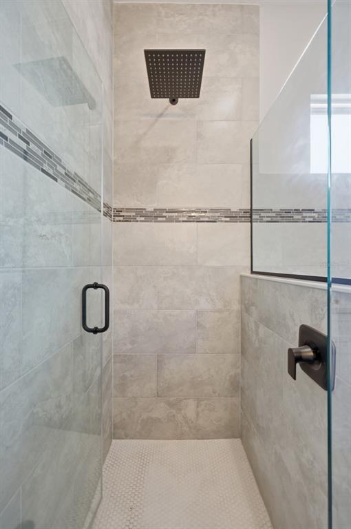 4487 Southwest 152nd Street Ocala, FL 34473 - Photo 21 of 41 a bathroom with a shower
