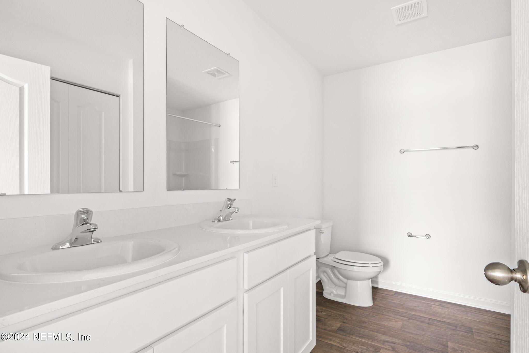12470 Rubber Fig Terrace Jacksonville, FL 32218 - Photo 11 of 20 a bathroom with a sink and a toilet