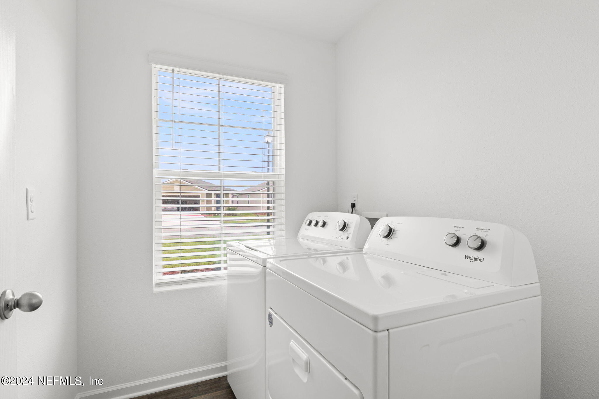 12470 Rubber Fig Terrace Jacksonville, FL 32218 - Photo 15 of 20 a utility room with dryer and washer