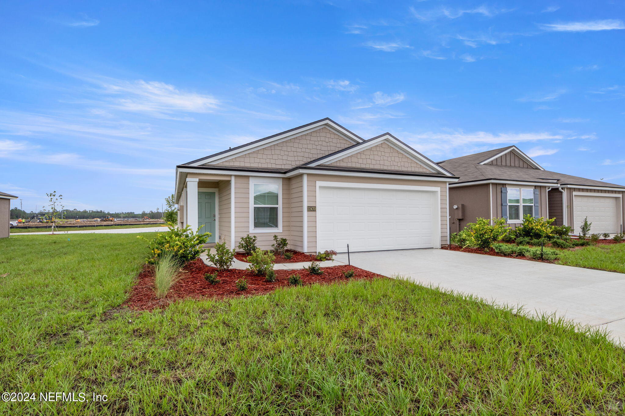 12470 Rubber Fig Terrace Jacksonville, FL 32218 - Photo 3 of 20 a backyard of a house with table and chairs