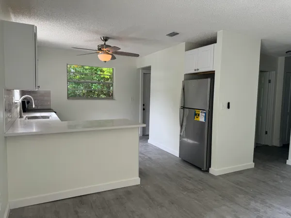 a room with furniture and a window