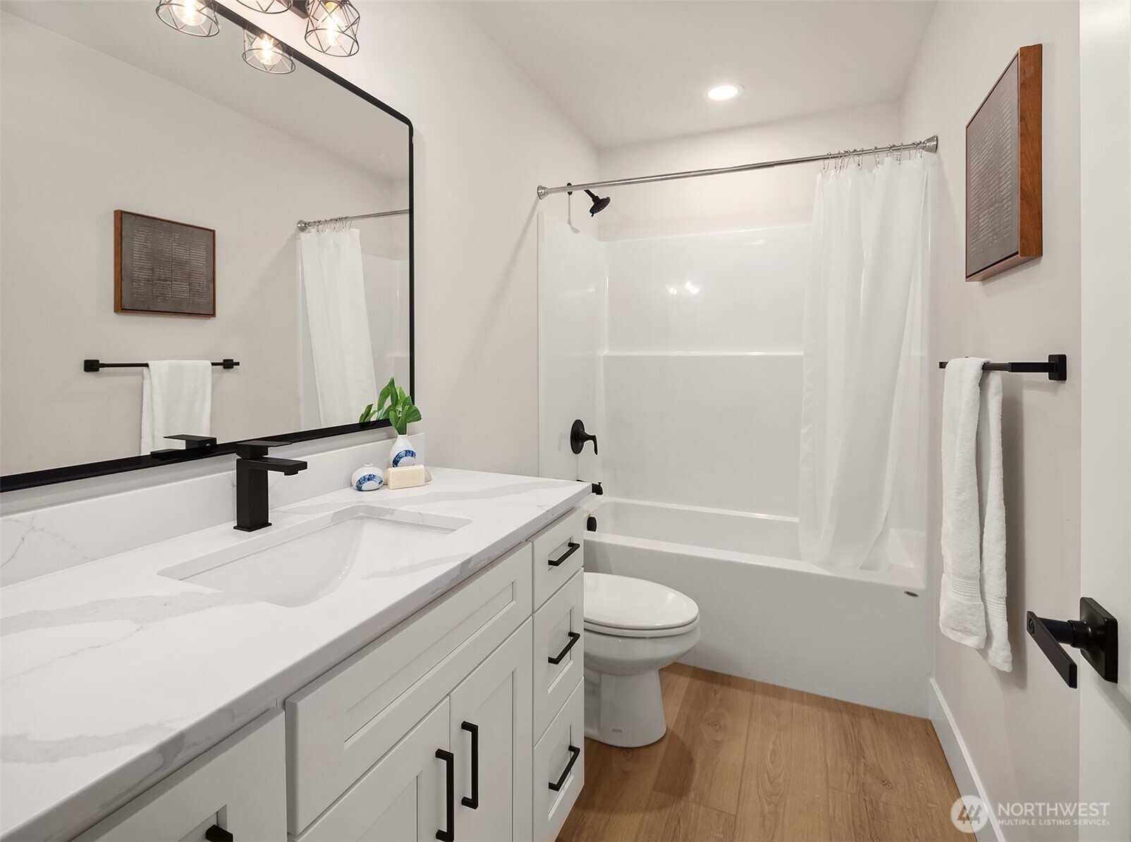 4 Twin Flower Circle Bellingham, WA 98229 - Photo 25 of 31 a bathroom with a sink a toilet a mirror and shower