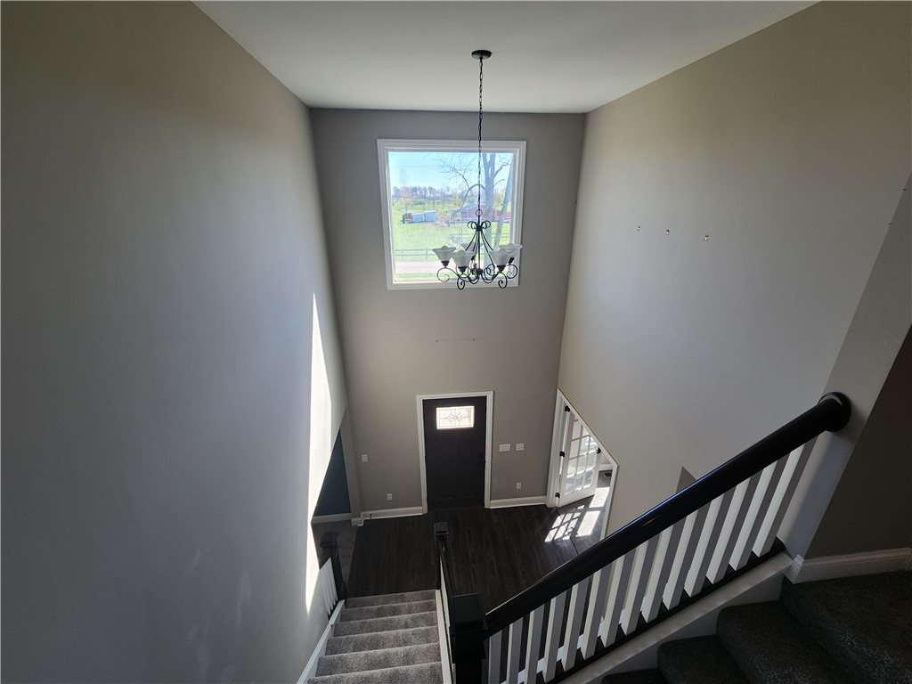 7441 Dodson Road Brookville, OH 45309 - Photo 15 of 50 This inviting entry features high ceilings and a captivating view, creating a grand welcome.