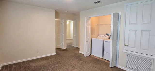 an empty room with a door