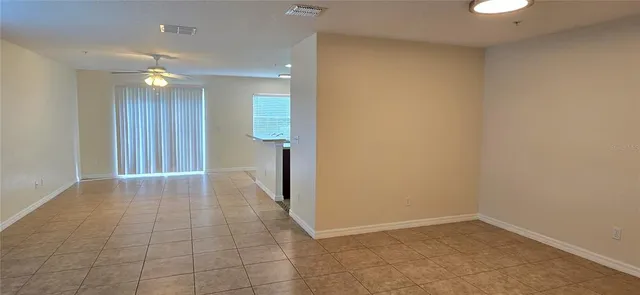 wooden floor in a room with a bathroom