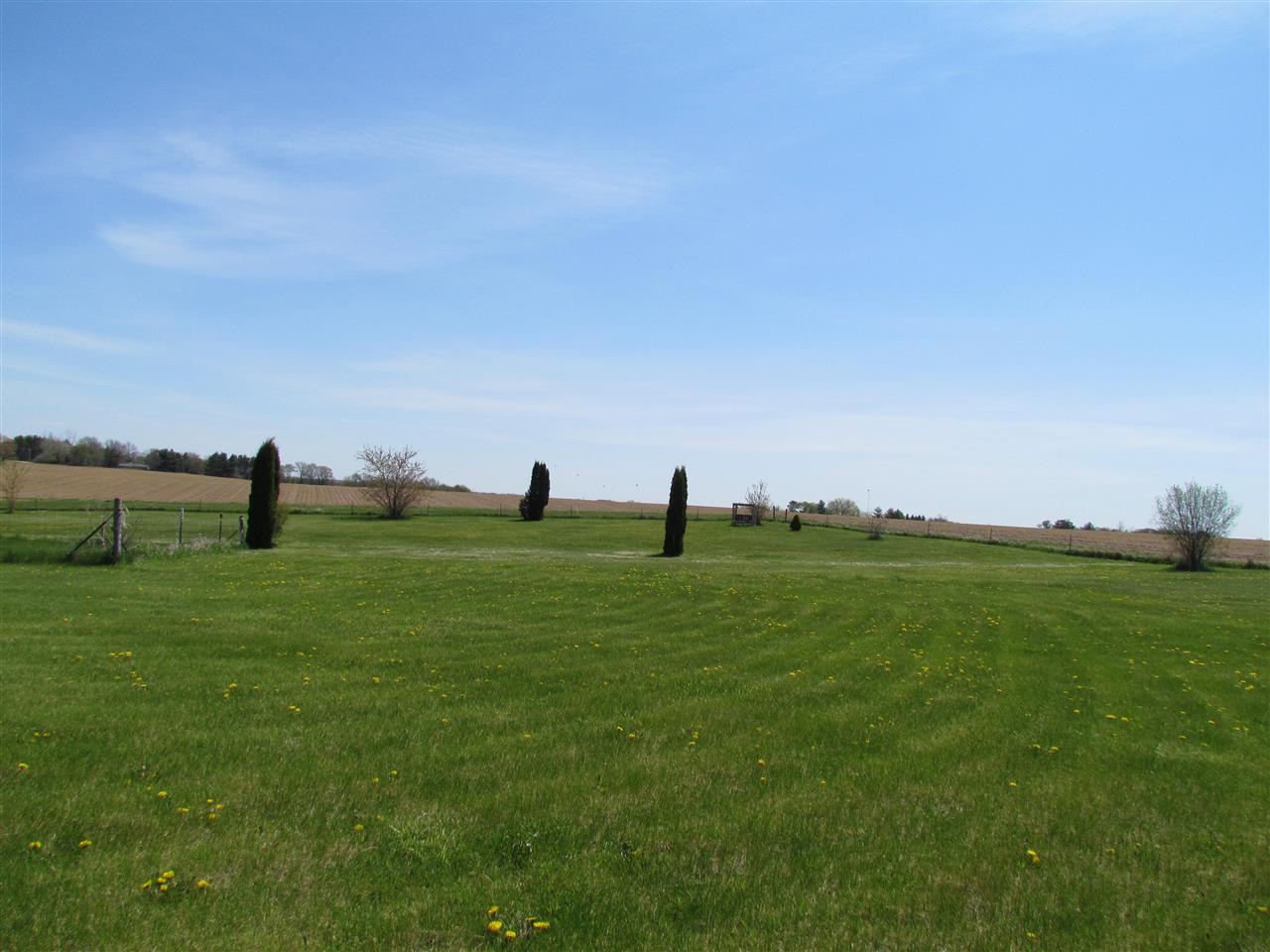 10494 Freeport Road Durand, IL 61024 - Photo 2 of 40 a view of field with grass and trees