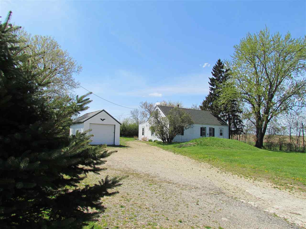 10494 Freeport Road Durand, IL 61024 - Photo 31 of 40 a view of a house with a yard