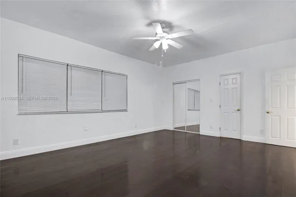 a view of an empty walk in closet