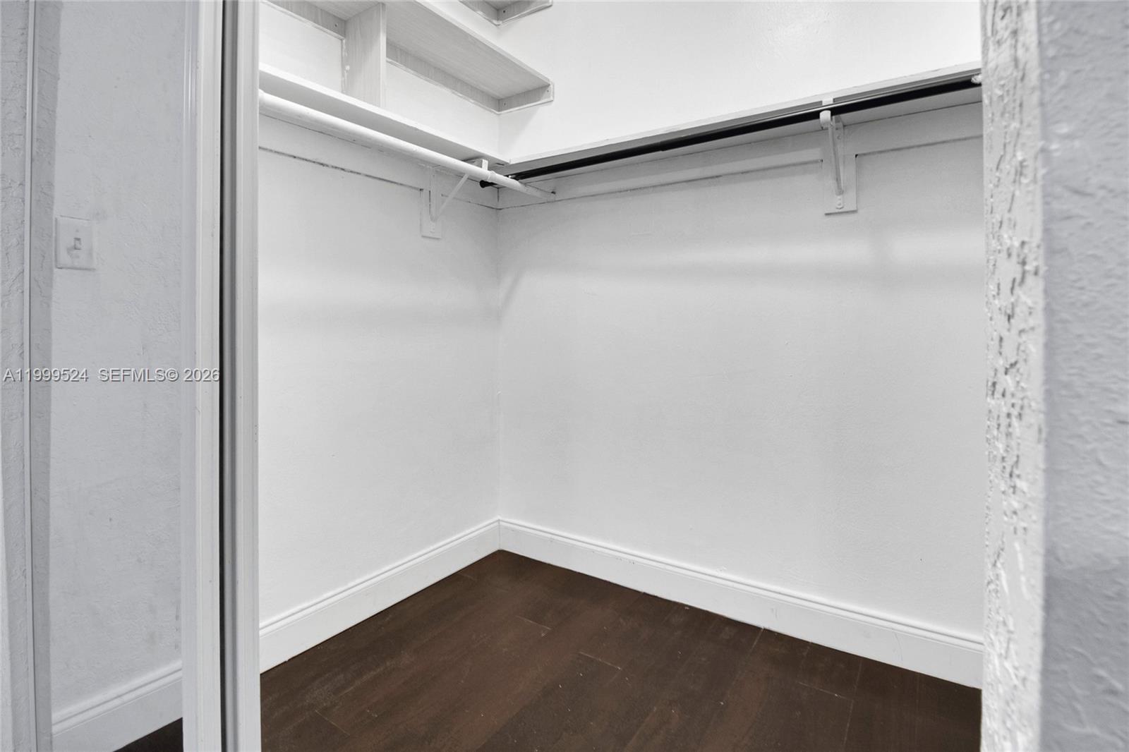 1925 Northwest 49th Street Miami, FL 33142 - Photo 17 of 30 a view of an empty walk in closet