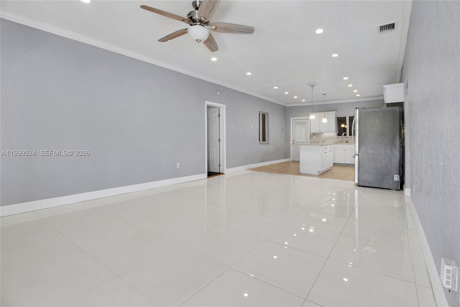 1925 Northwest 49th Street Miami, FL 33142 - Photo 5 of 30 a view of an empty room with a window