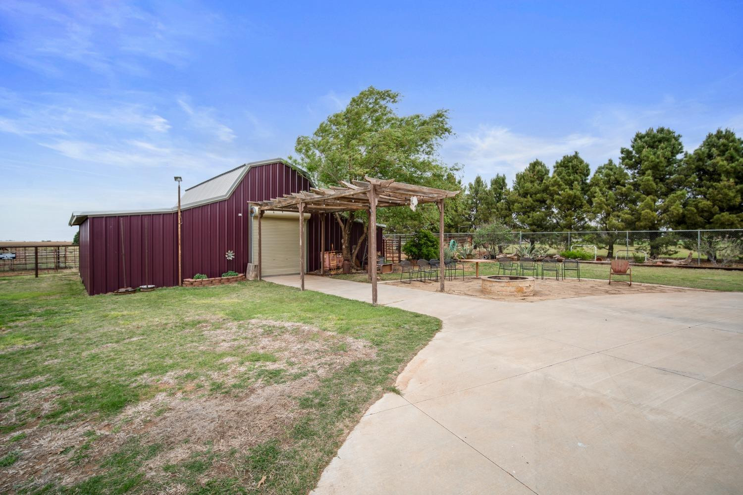 9002 Woodrow Road Wolfforth, TX 79382 - Photo 31 of 48 a view of a backyard
