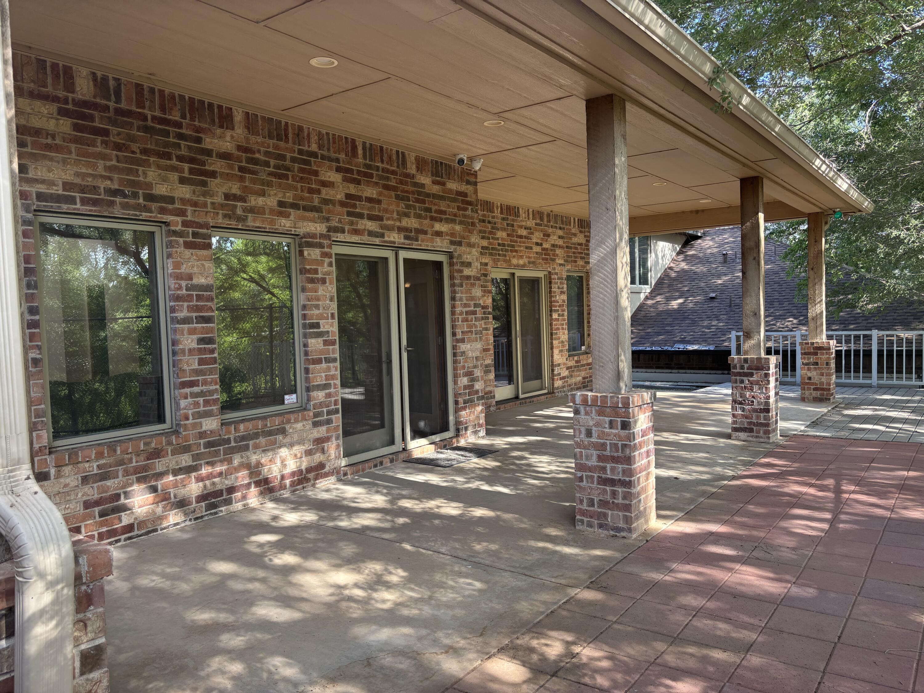 33 West Lakeshore Drive Ransom Canyon, TX 79366 - Photo 10 of 48 a view of a entrance gate of the house