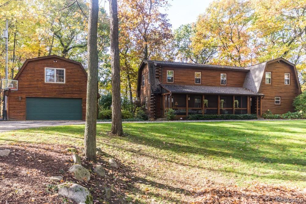 9191 Pine Knob Road Clarkston, MI 48348 - Photo 2 of 51 29x29 Oversized 2.5 Car Garage w/Loft