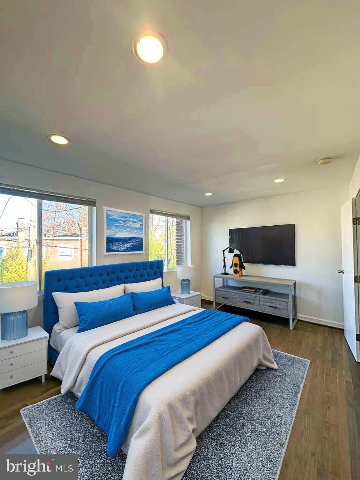 137 West Reed Avenue Alexandria, VA 22305 - Photo 11 of 17 a bedroom with a bed and a couch