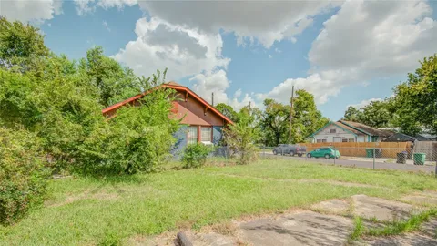 a view of yard with swimming pool