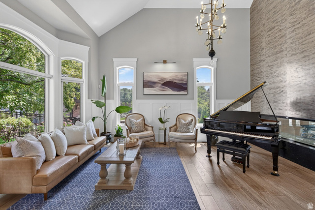 12308 Mariah Circle Draper, UT 84020 - Photo 18 of 293 Spacious living area featuring a vaulted ceiling and large arched windows