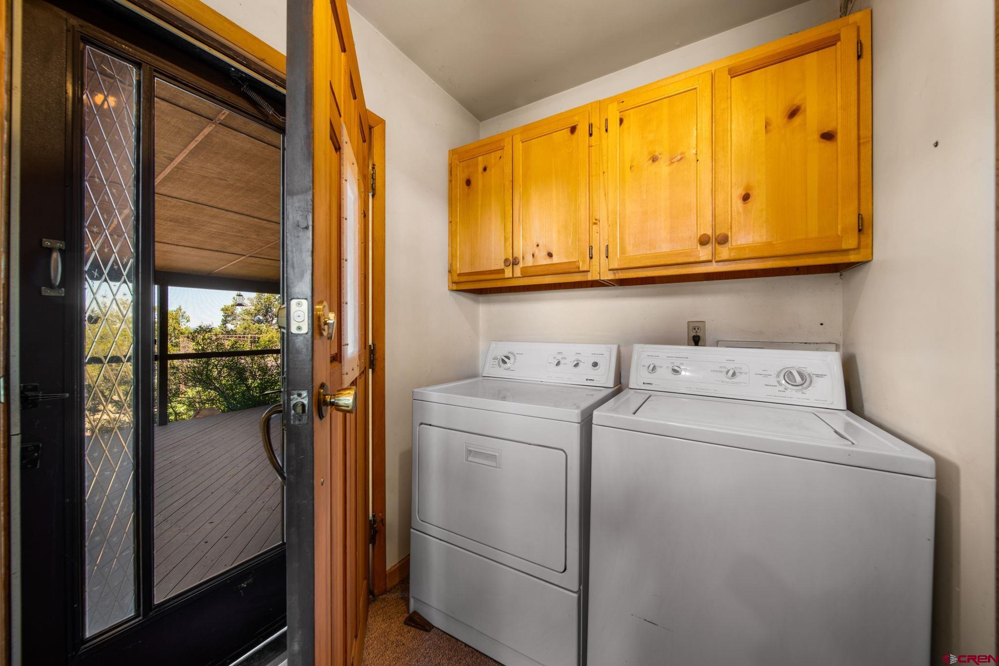 27255 Rd P Dolores, CO 81323 - Photo 11 of 45 a utility room with dryer and washer