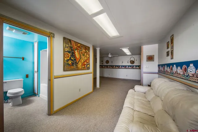 a big room with closet and windows