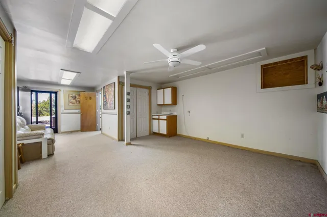 a view of an aerial view of residential houses and lake view