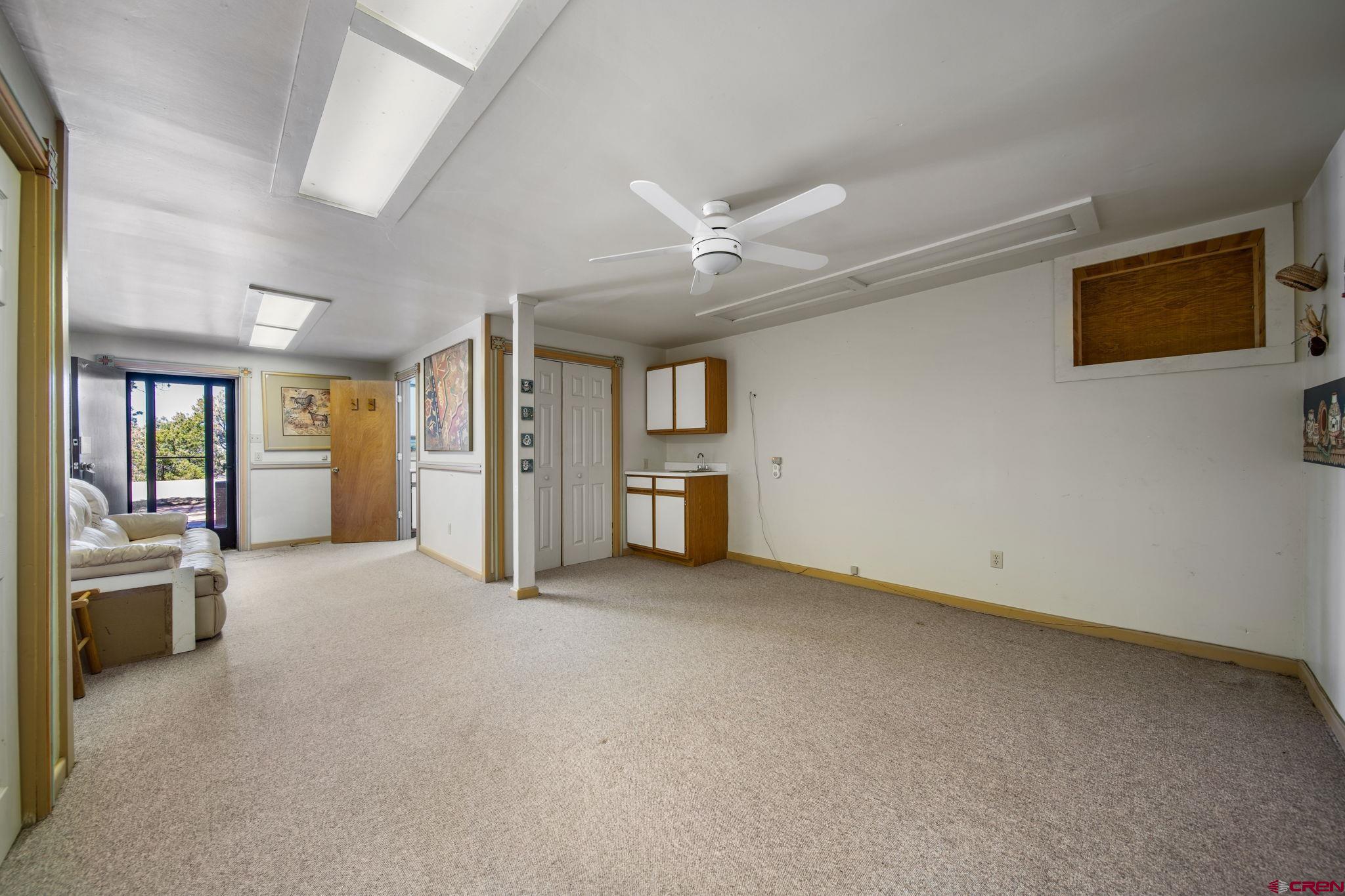 27255 Rd P Dolores, CO 81323 - Photo 21 of 45 an empty room with closet and windows