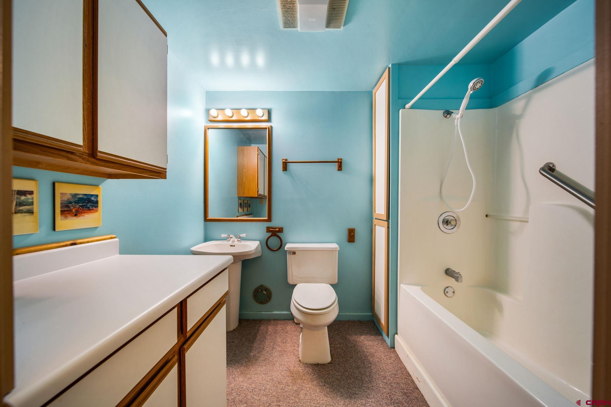 27255 Rd P Dolores, CO 81323 - Photo 22 of 45 a bathroom with a sink a toilet and a bathtub
