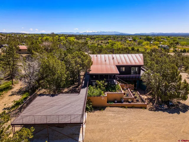 a view of lake with green space