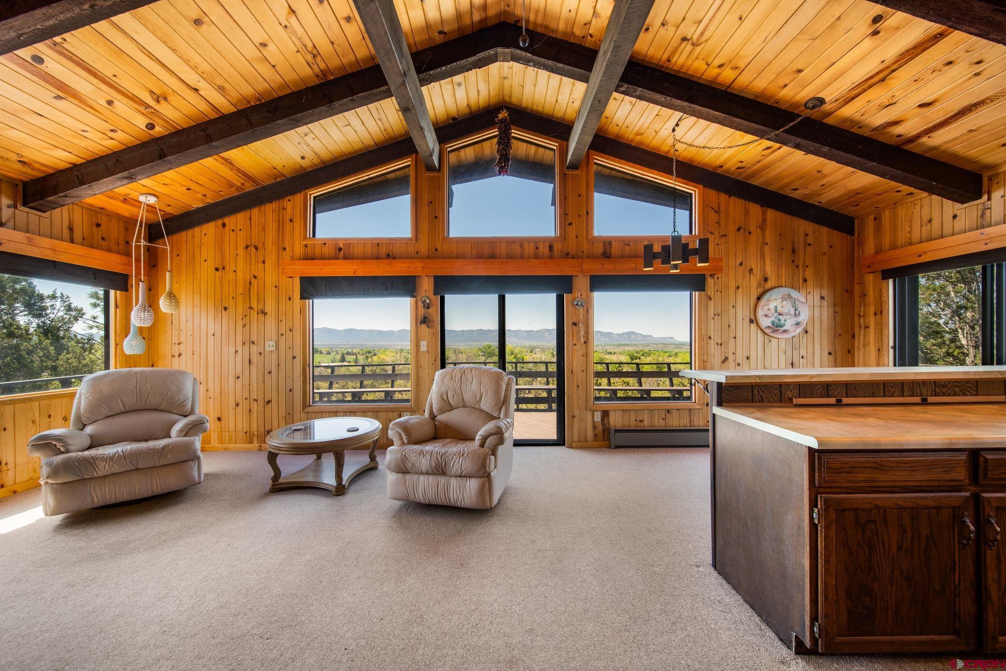 27255 Rd P Dolores, CO 81323 - Photo 5 of 45 a living room with furniture and gym equipment