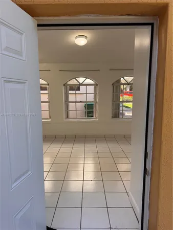 view of empty room with windows