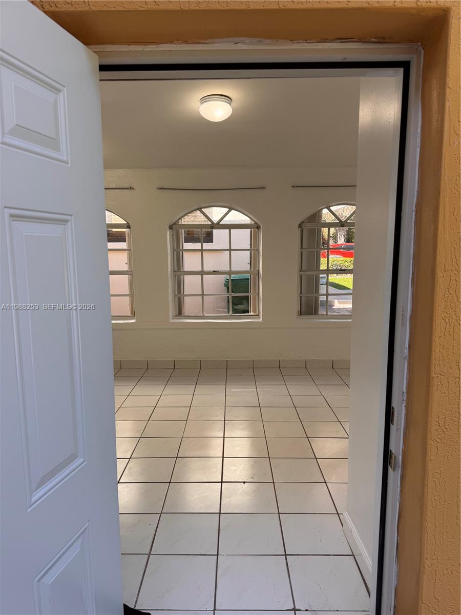 4472 Southwest 9th Lane, Unit 1 Miami, FL 33134 - Photo 3 of 10 view of empty room with windows