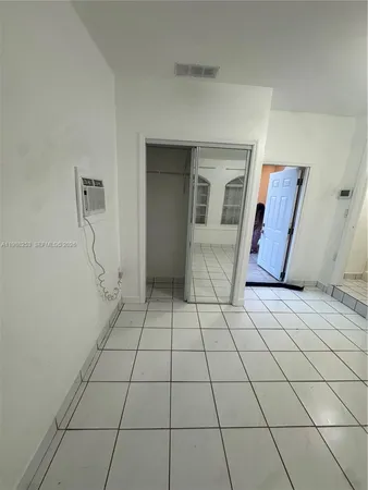 a bathroom with a shower and toilet