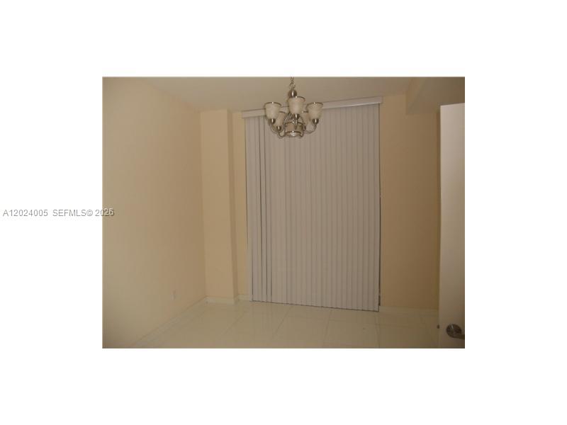 2525 Southwest 3rd Avenue, Unit 1006 Miami, FL 33129 - Photo 8 of 13 a black and white wall with a window