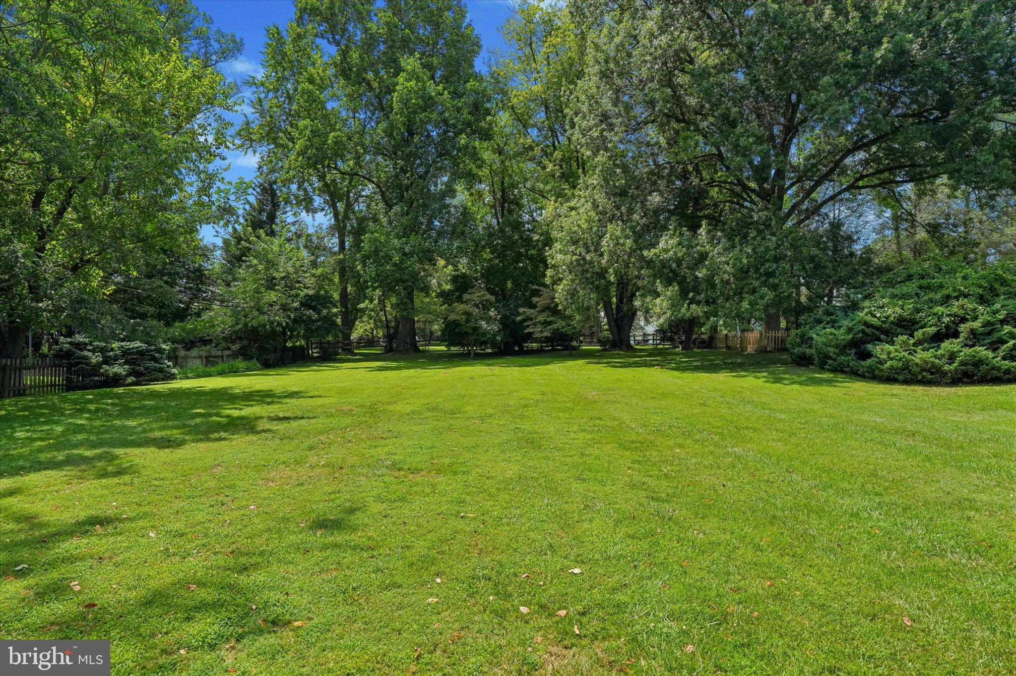 1910 Stone Ridge Lane Villanova, PA 19085 - Photo 34 of 46 Lush green oasis under blue skies.