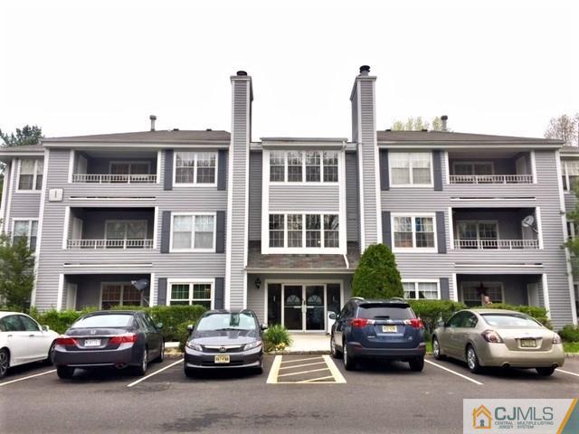 111 Raintree Court, Unit 111 Helmetta, NJ 08828 - Photo 1 of 11 a building view