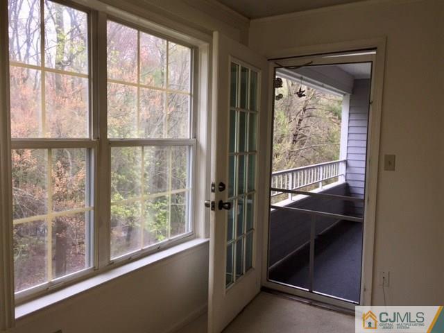 111 Raintree Court, Unit 111 Helmetta, NJ 08828 - Photo 2 of 11 a view of balcony
