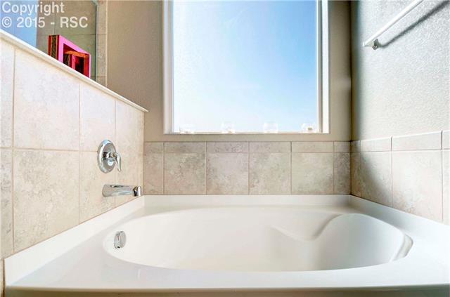 2174 Reed Grass Way Colorado Springs, CO 80915 - Photo 21 of 27 Soaking tub in master bath
