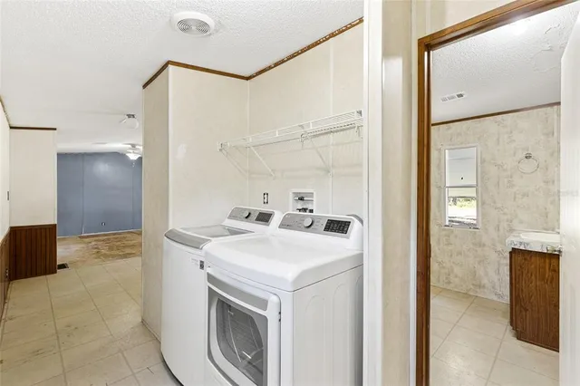 a view of bathroom with a sink and a mirror