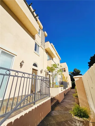 a view of a balcony with staircase