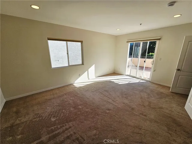 a view of a room with an empty space