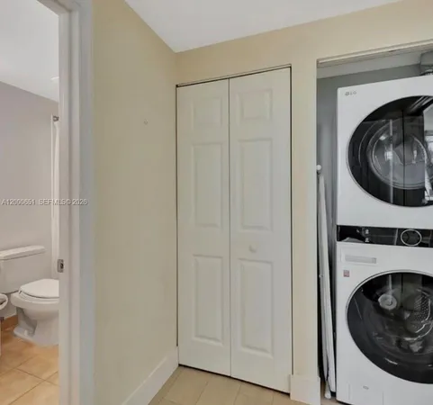 a bathroom with a shower and a bath tub