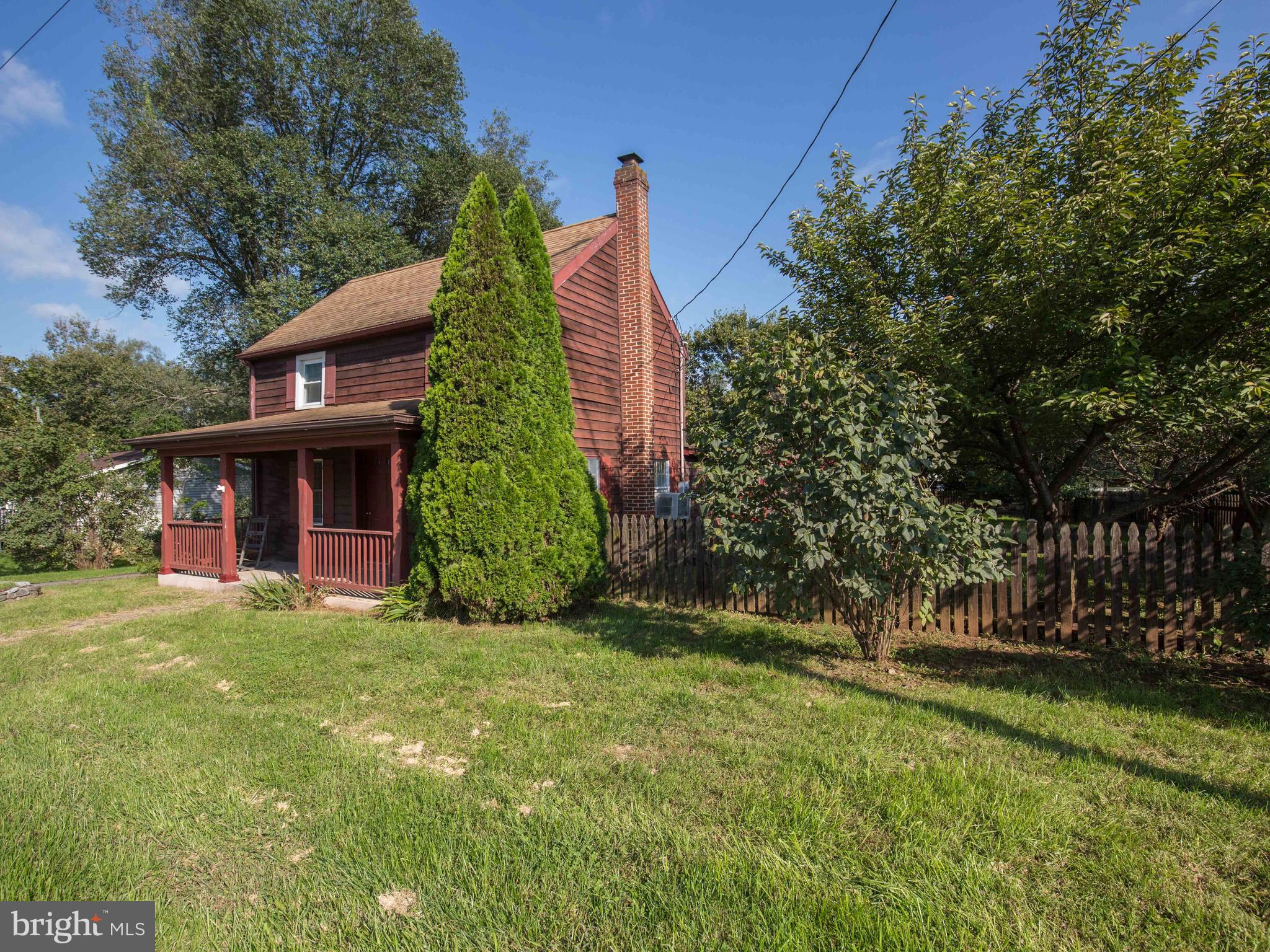 193 Giles Mill Road Bunker Hill, WV 25413 - Photo 3 of 29 a view of a house with a yard