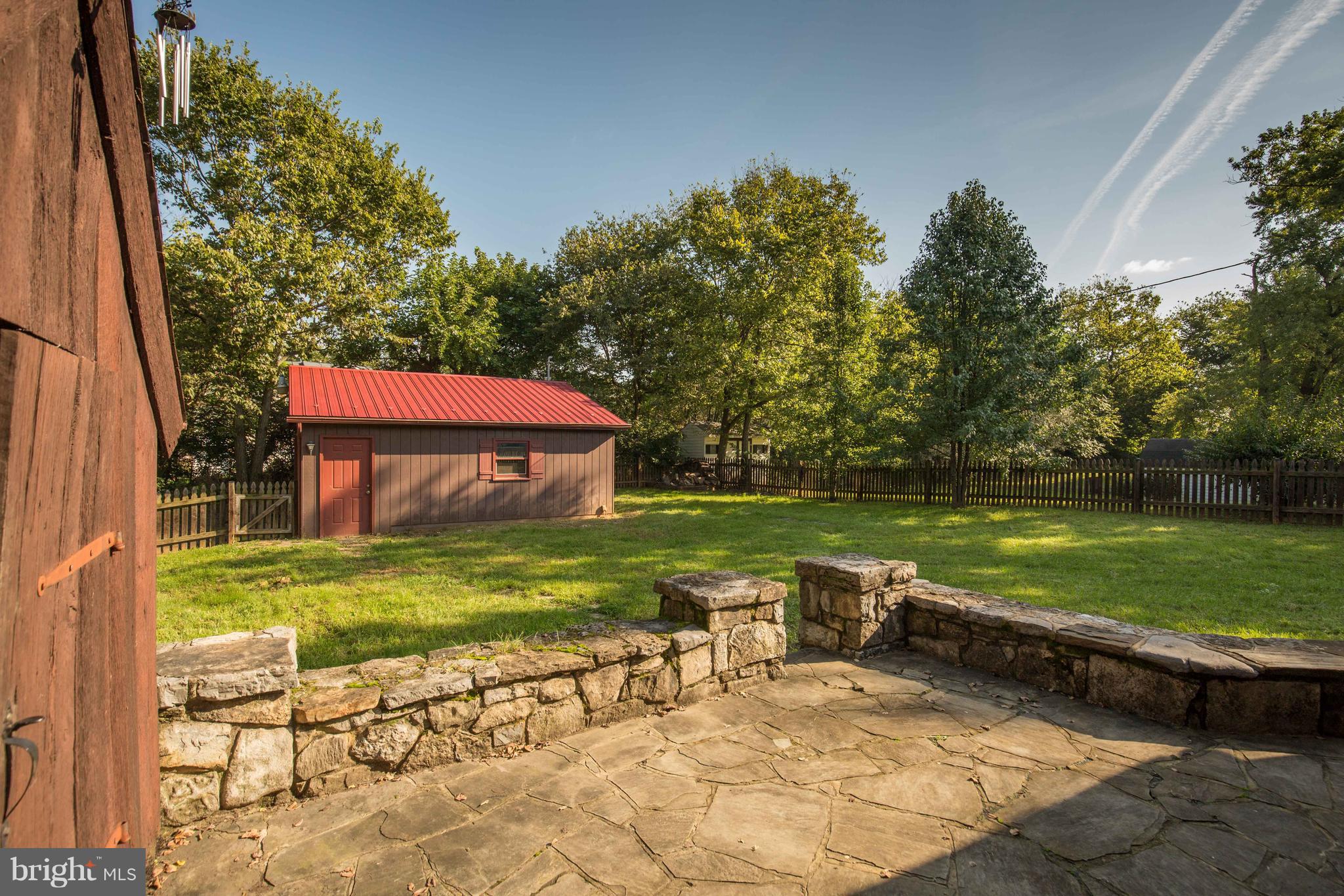193 Giles Mill Road Bunker Hill, WV 25413 - Photo 6 of 29 a view of a two chairs and a table in a yard