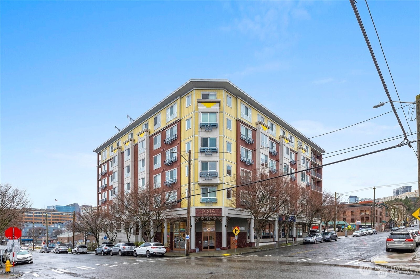 668 South Lane Street, Unit 603 Seattle, WA 98104 - Photo 21 of 22 a view of a tall building next to a road