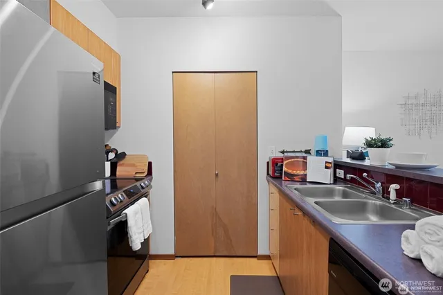 a bathroom with a sink and mirror