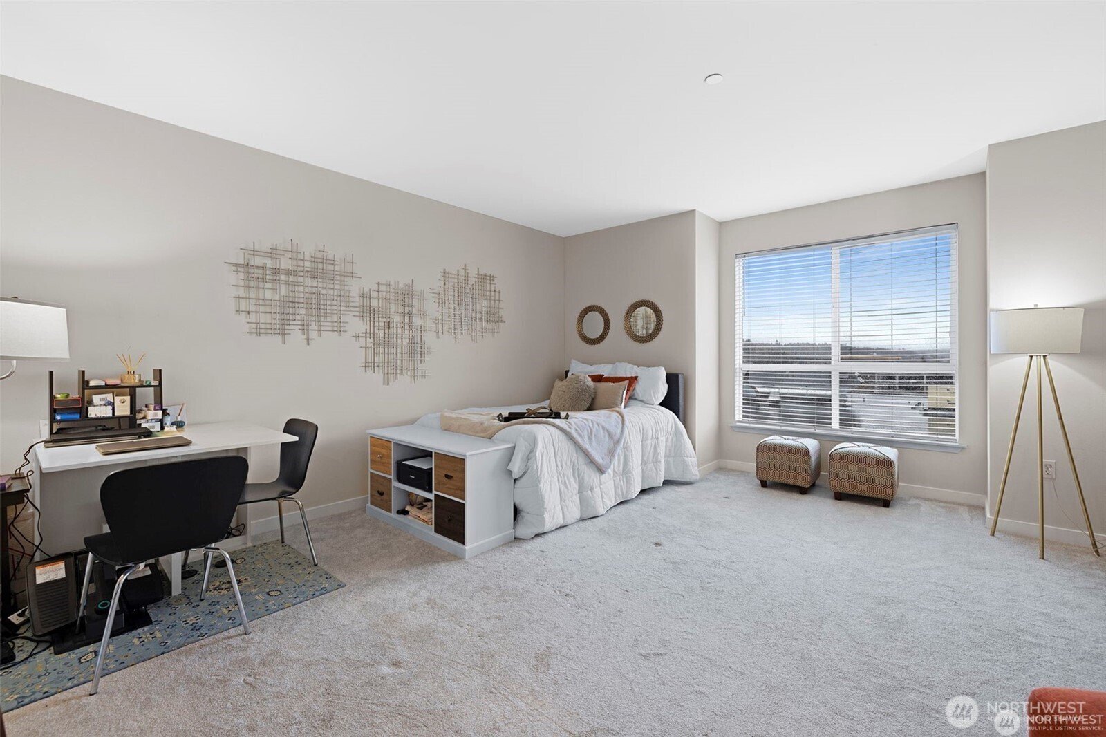 668 South Lane Street, Unit 603 Seattle, WA 98104 - Photo 8 of 22 a bedroom with furniture and a large window