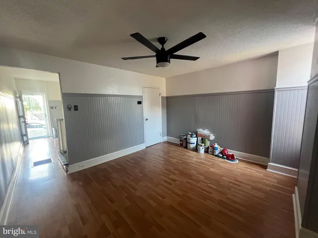 a view of livingroom with wooden floor
