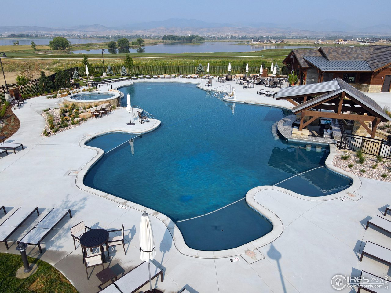 2553 Southwind Road Berthoud, CO 80513 - Photo 11 of 14 a view of a swimming pool and lounge chair